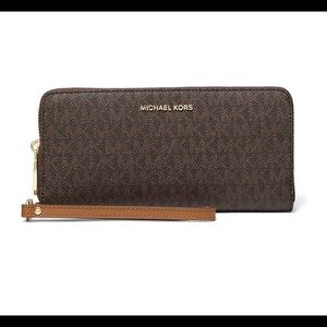 MK zip around brown signature wallet